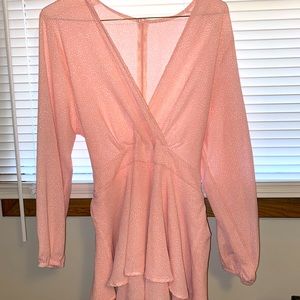 Baby pink romper with ruffles